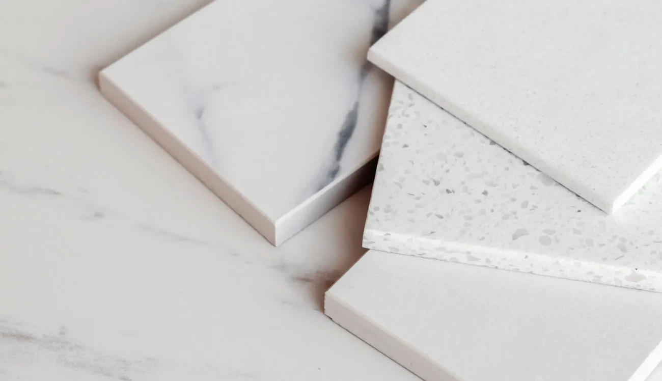 Marble countertop with samples on top.