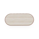 A top-down perspective of the Altea table, revealing the unique textures and soft, organic hues of the premium travertine slab.