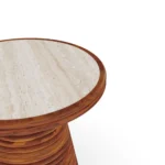 Bari accent table by Mediterrazza in iroko wood and stone, handcrafted terrace furniture with a ribbed base and sculptural stone surface.