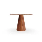 A direct view of the Cagliari table, showcasing the warm wood grain of the base contrasted with the natural pink veining of the marble.