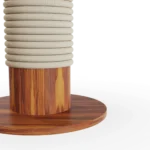 Close-up of the Calpe table leg, highlighting the delicate cord wrapping and the seamless joint with the iroko wood structure.