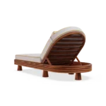 Back perspective of the Jondal lounger by Mediterrazza, emphasizing the sculptural conical feet and the solid iroko wood structure.