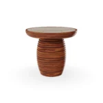 Mijas side table by Mediterrazza in iroko wood and travertine, featuring a ribbed sculptural base and natural stone inlaid top.
