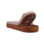 The back of the Paros sunbed, revealing a distinctive arched wooden support and the adjustable reclining mechanism.