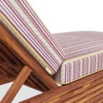 A tight shot of the cushion corner, showing the contrast between the striped pattern and the meticulous piping finish.