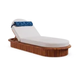 Sóller sunbed by Mediterrazza in iroko wood, featuring a bohemian ribbed base and thick cushions in coastal tones.