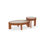 Trapani side table by Mediterrazza in iroko and travertine, featuring a carved wooden base and a sophisticated stone-top modular design.