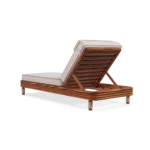 Rear perspective of the Valletta sunbed, highlighting the sturdy iroko wood backrest and the clean lines of its Mediterranean construction.