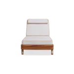 A direct view of the Valletta lounger, where the warmth of the handcrafted wooden frame meets soft, coastal-inspired upholstery.