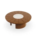 Volpe table by Mediterrazza, handcrafted outdoor coffee table in iroko wood with a refined natural stone centerpiece and sun-ray design.