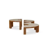 Benissa coffee table by Mediterrazza with iroko base and ceramic top, sculptural circular furniture inspired by coastal landscapes.