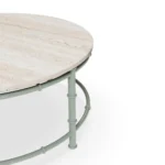 Girona table by Mediterrazza, round coffee table with a bamboo-style metal structure and refined stone-inspired Mediterranean surface.