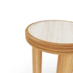 Lagos side table by Mediterrazza, handcrafted modular furniture with a travertine stone top and warm iroko wood organic frame.