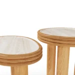 Lagos modular table by Mediterrazza in iroko wood and natural travertine, designed for fluid compositions in luxury outdoor spaces.