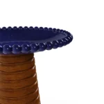Nice table by Mediterrazza, outdoor side table with a solid iroko wood base and a bead-detailed ceramic top in coastal blue.