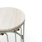 Toulon table by Mediterrazza, outdoor side table with a stone top and metal frame detailed with handcrafted iroko wood spheres.