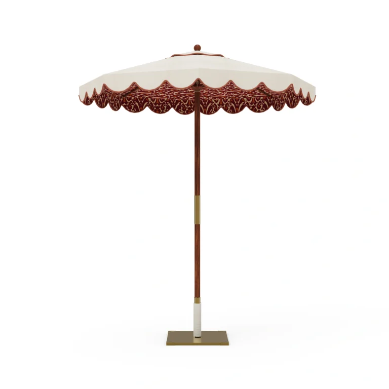 Elba parasol by Mediterrazza in iroko wood and textile, featuring a vintage canopy with decorative piping and a handcrafted wood base.