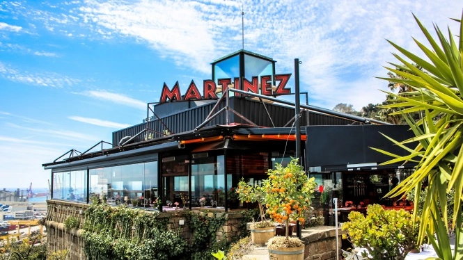 Terraza Martínez in Montjuïc, an iconic open-air restaurant in Barcelona featuring panoramic views, modern architecture, and Mediterranean outdoor dining.
