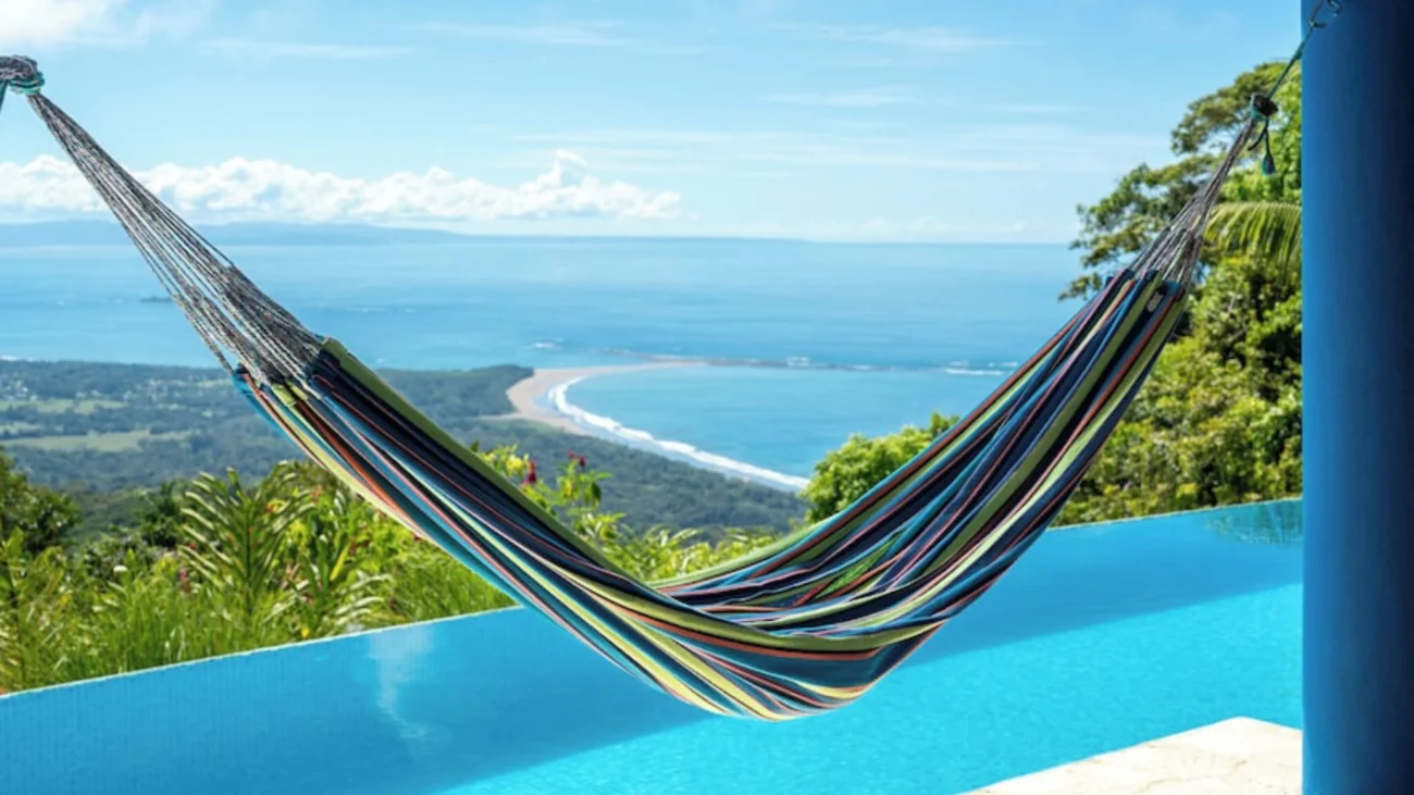 Bahia beach house showcasing Brazilian coastal architecture with hammocks, tropical outdoor seating, shaded terraces, and oceanfront verandas.