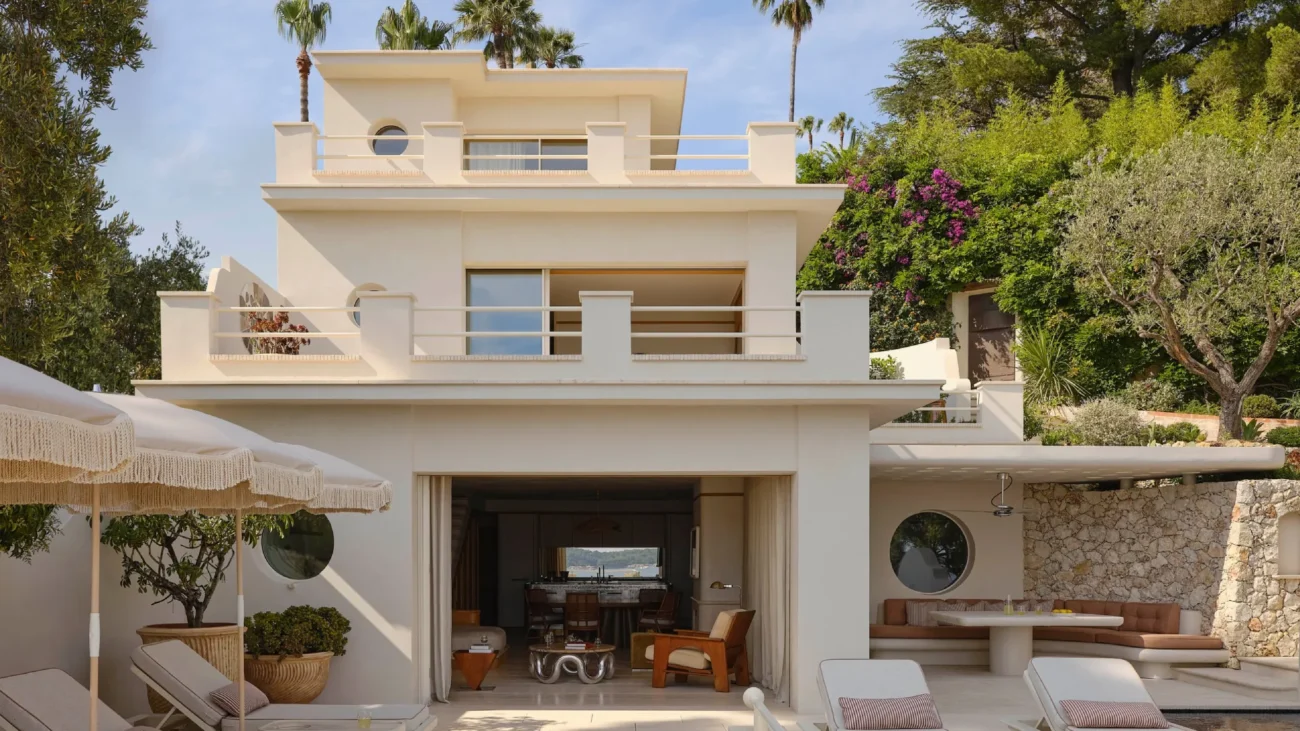 Mediterranean summer house architecture with sea views, natural stone materials, and elegant outdoor living spaces reflecting coastal luxury homes and the Mediterranean lifestyle.