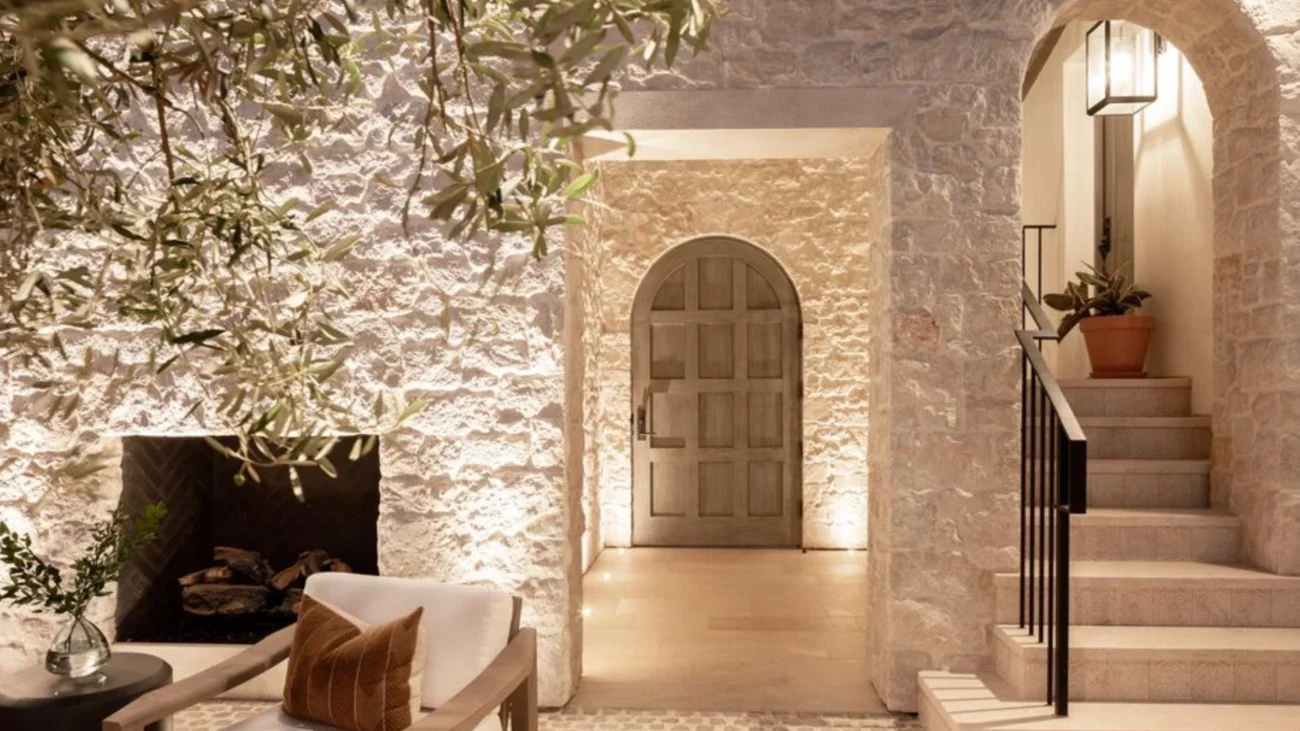 Mediterranean summer house architecture with sea views, natural stone materials, and elegant outdoor living spaces reflecting coastal luxury homes and the Mediterranean lifestyle.