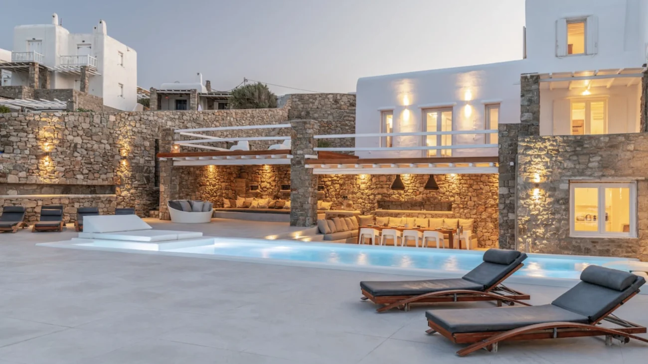 Luxury outdoor daybeds on Mediterranean terraces and Caribbean beachfront villas showcasing high-end outdoor living and contemporary coastal furniture design.