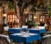 Elegant courtyard restaurants in Spain featuring beautiful outdoor dining patios and alfresco dining spaces surrounded by historic architecture, fountains, and Mediterranean gardens.