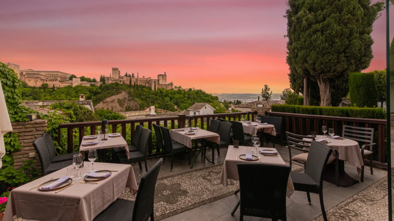 Elegant courtyard restaurants in Spain featuring beautiful outdoor dining patios and alfresco dining spaces surrounded by historic architecture, fountains, and Mediterranean gardens.