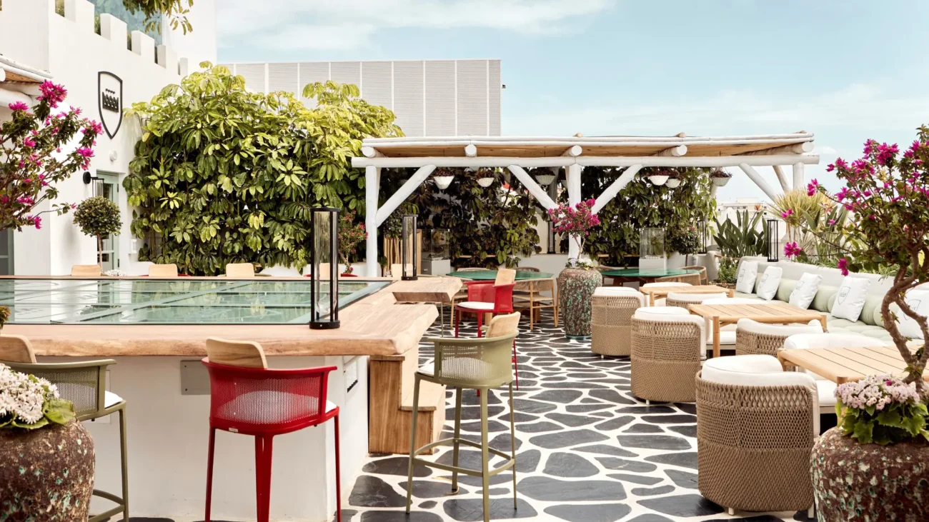 Luxury outdoor dining terrace at a Marbella beachfront restaurant showcasing elegant Mediterranean design, sea views, and refined alfresco atmosphere.