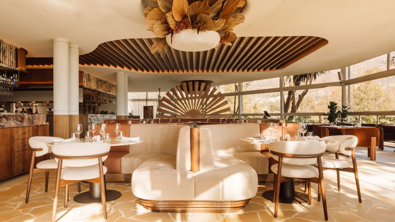 Luxury outdoor dining terrace at a Marbella beachfront restaurant showcasing elegant Mediterranean design, sea views, and refined alfresco atmosphere.