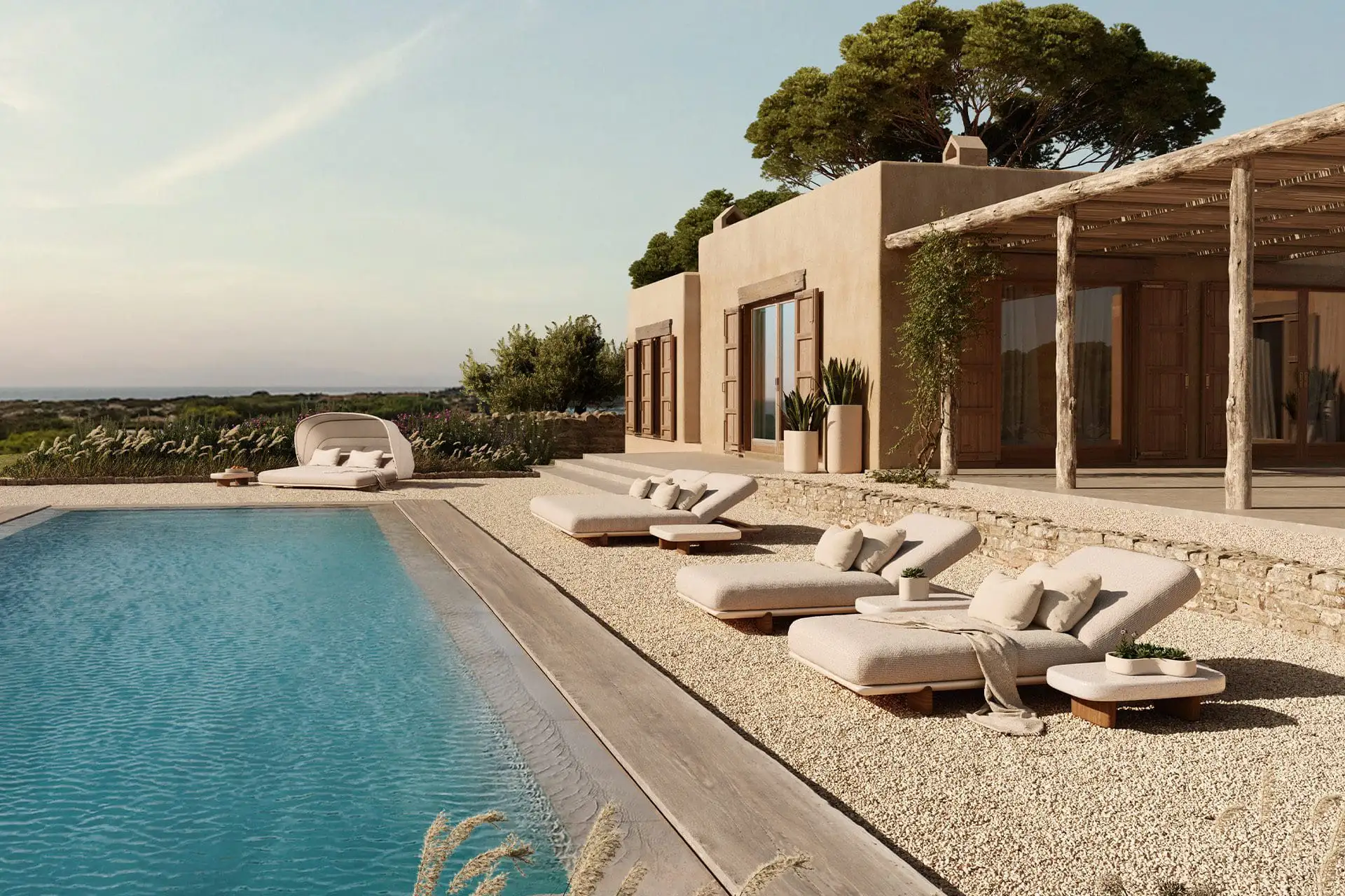 Oudoor furniture, such as luxury sun beds, in a pool side.