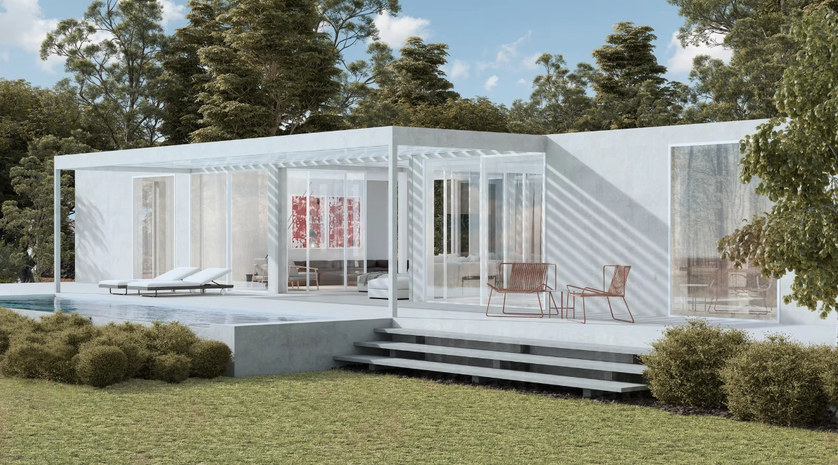 Casa Apollo by Teresa Sapey with large glass doors, a patio with chairs, and a pool. Surrounded by lush greenery under a clear blue sky.