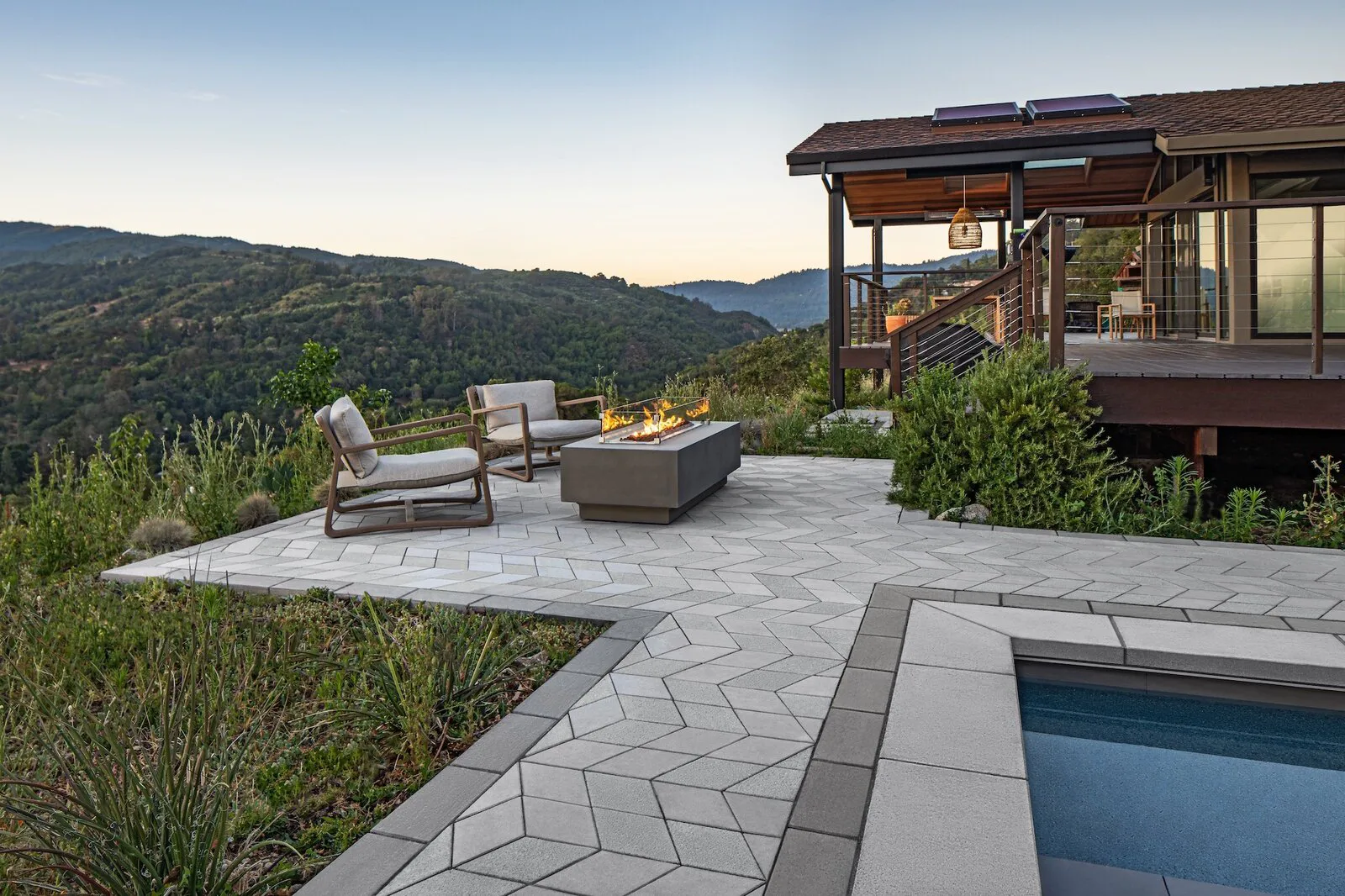 Outdoor display of a small area of furniture on the poolside.