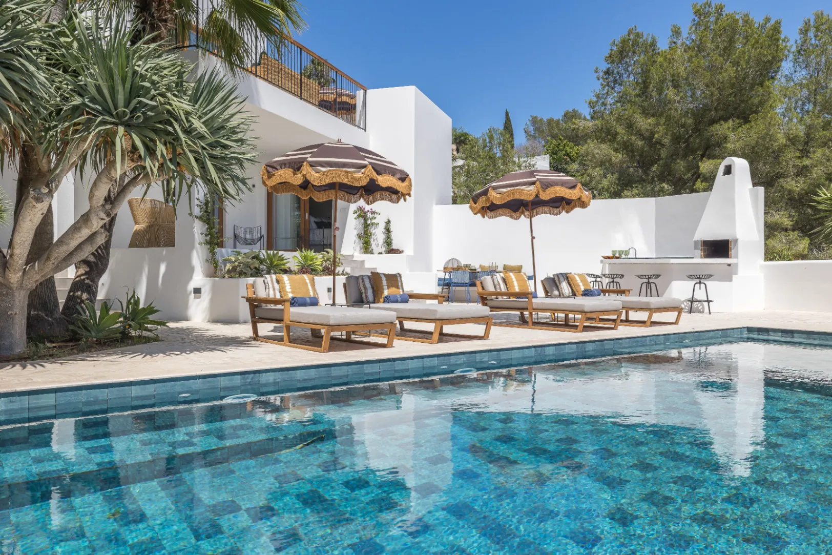 Luxury Coastal Real Estate highlighting modern coastal architecture with an infinity pool, natural landscapes, and premium outdoor design.