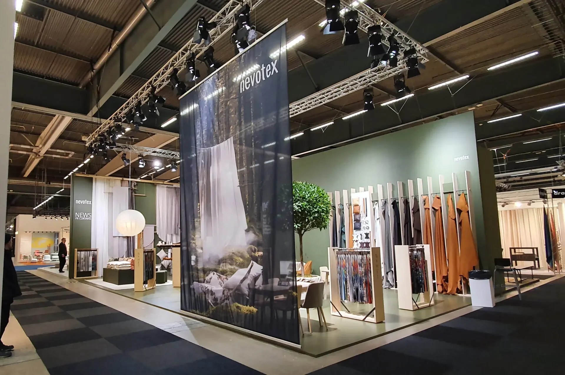 Nevotex interior textile and upholstery fabric booth display at the Formex trade fair.